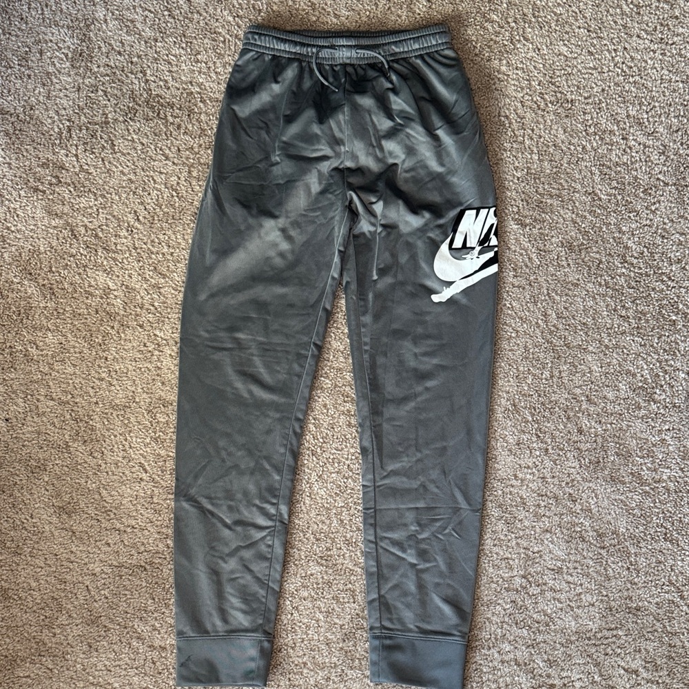 Nike Black Joggers with White Swoosh Graphic